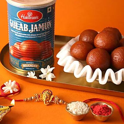 Sneh Ganesha Face Wooden Rakhi & Haldiram Gulab Jamun